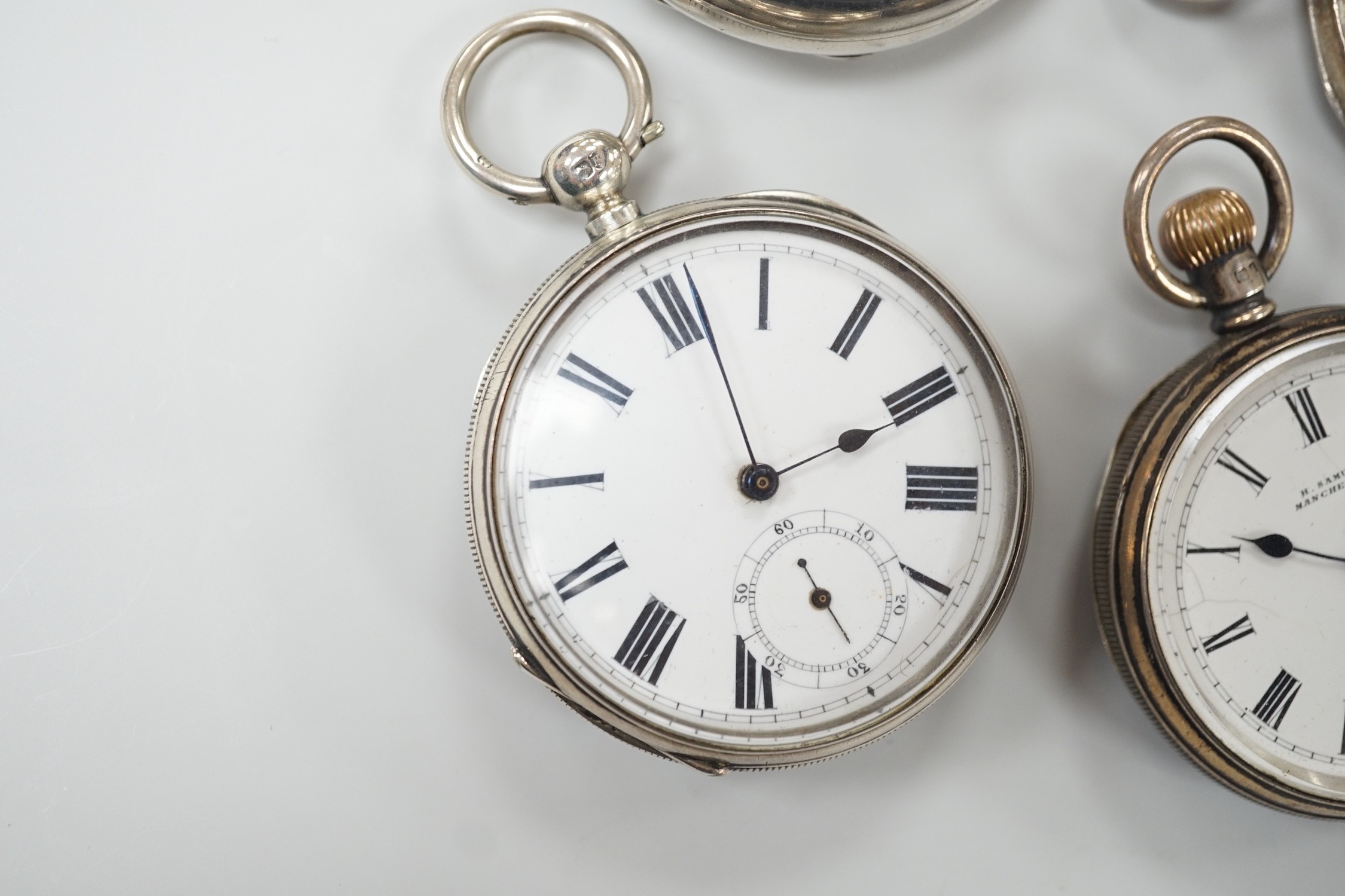 Three assorted Victorian and later silver open face pocket watches, including keywind and keyless and a silver hunter pocket watch.